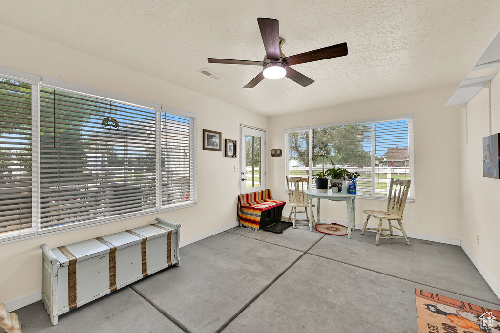 Sunroom / solarium featuring healthy amount of natural light