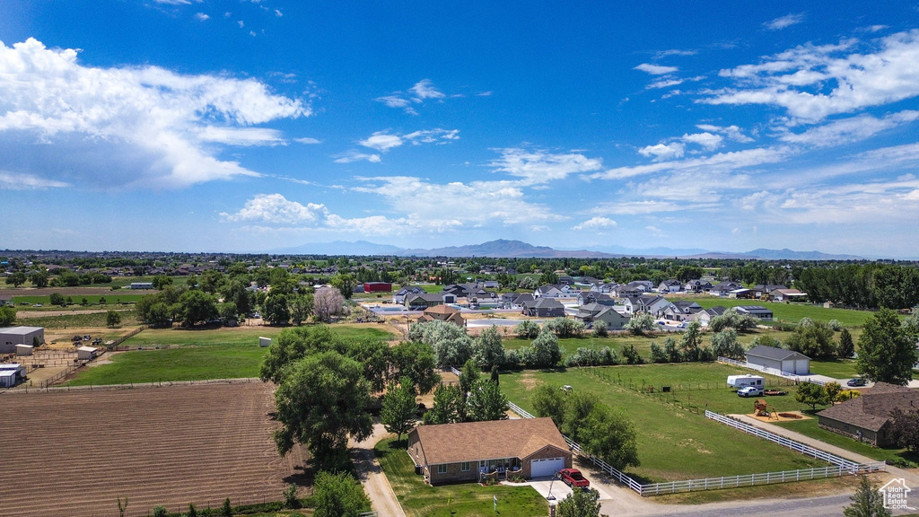 Aerial view of residential area with a mountain backdrop