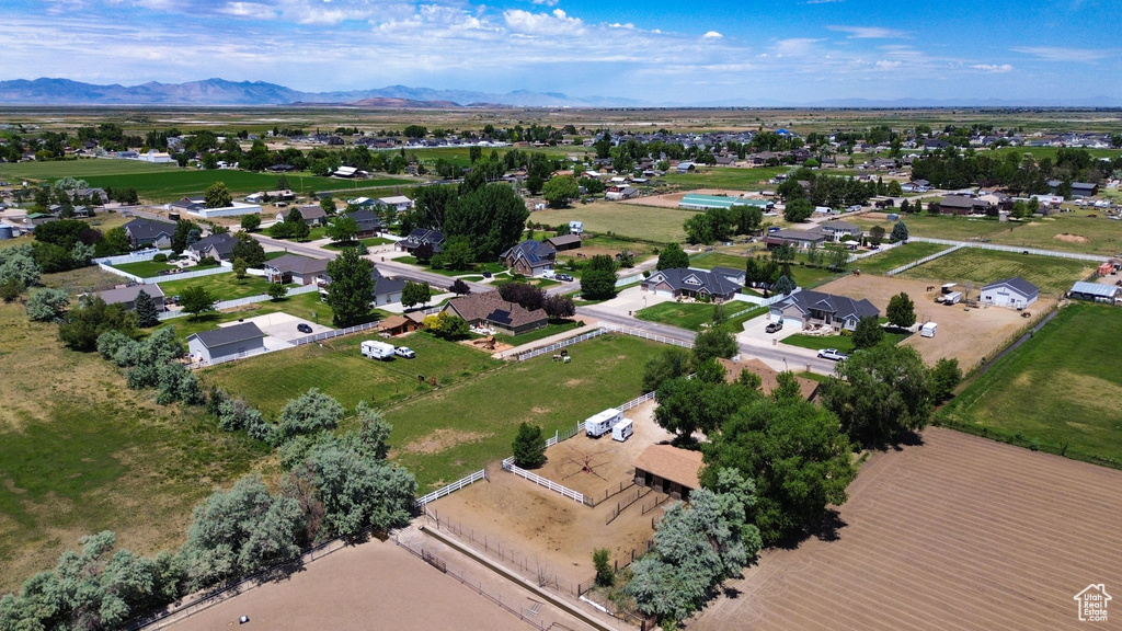 View of property location featuring a mountainous background and nearby suburban area