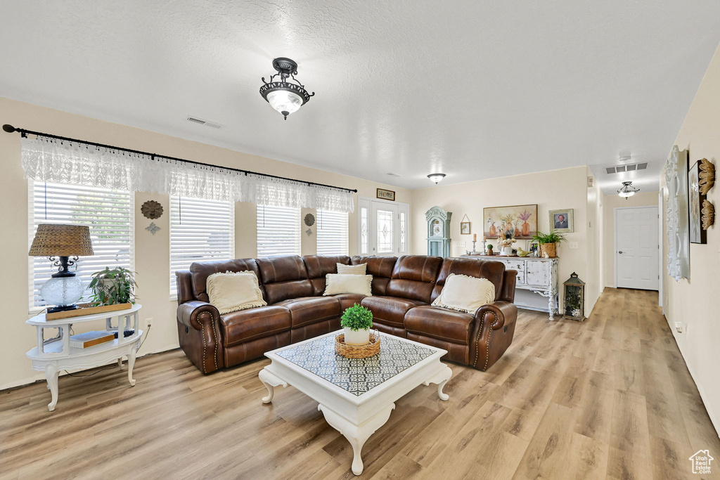 Living area featuring light wood finished floors