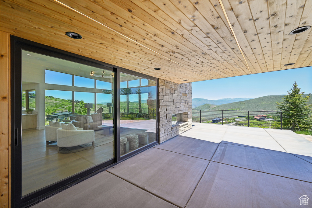 View of patio with a mountain view