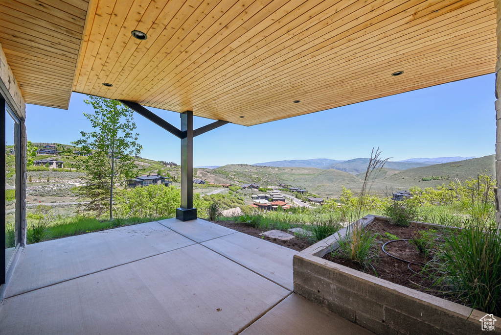 View of patio with a mountain view