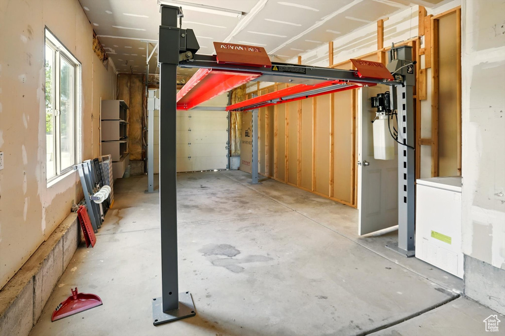 Garage with freestanding refrigerator