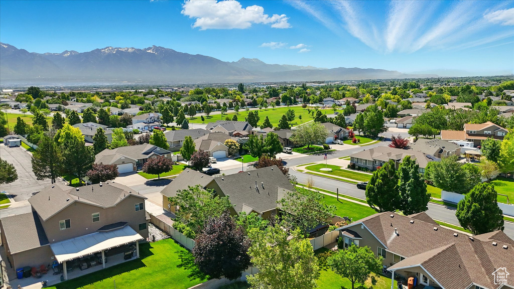 Aerial perspective of suburban area featuring mountains
