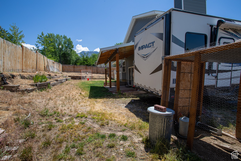 View of fenced backyard
