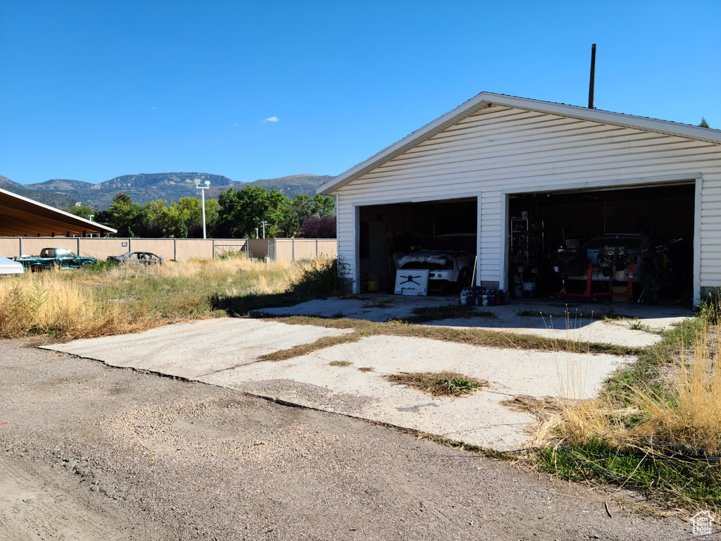 Detached garage with a mountain view