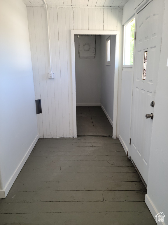 Entryway featuring wood-type flooring and baseboards