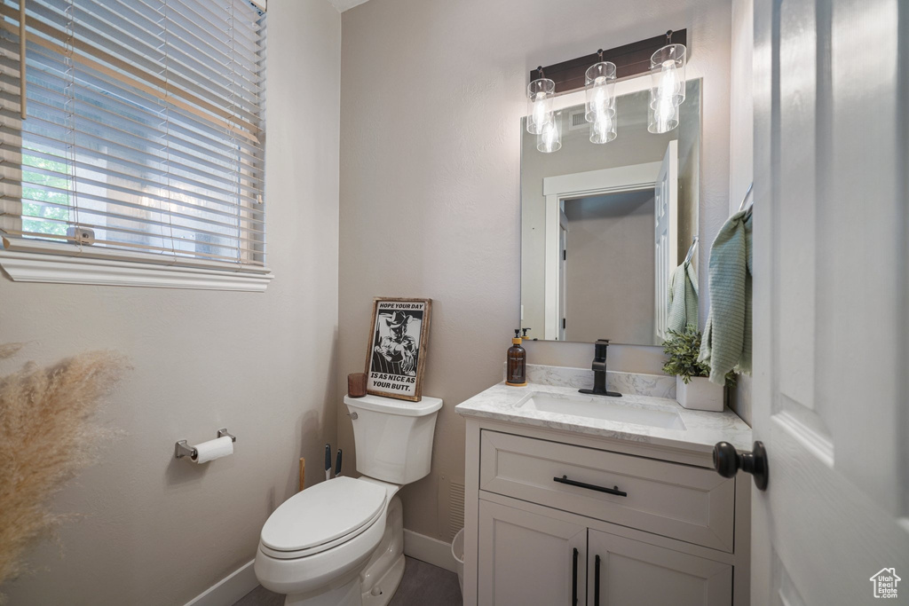 Bathroom featuring toilet and vanity
