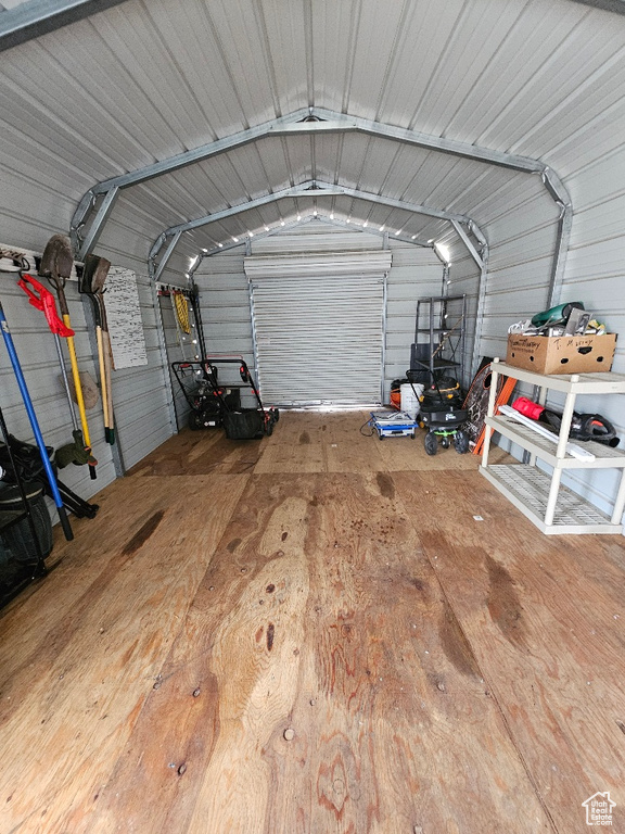 Garage featuring metal wall