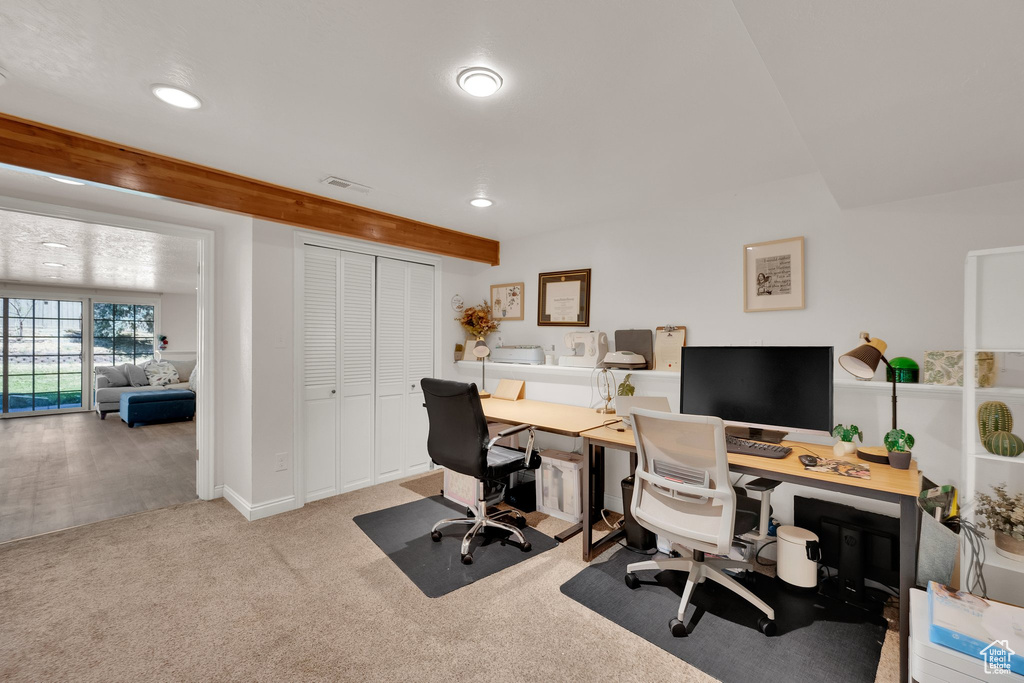 Office space featuring carpet and recessed lighting