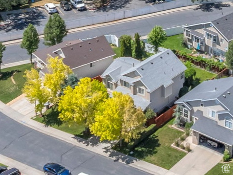 Aerial view of residential area featuring a mountain backdrop
