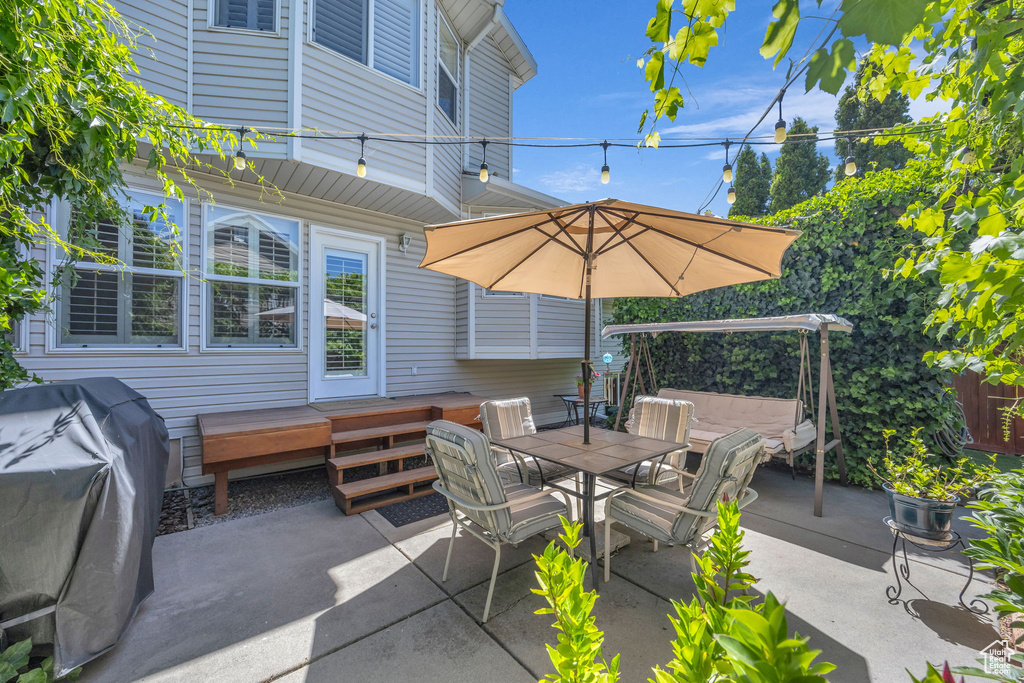 View of patio / terrace featuring outdoor dining area and grilling area