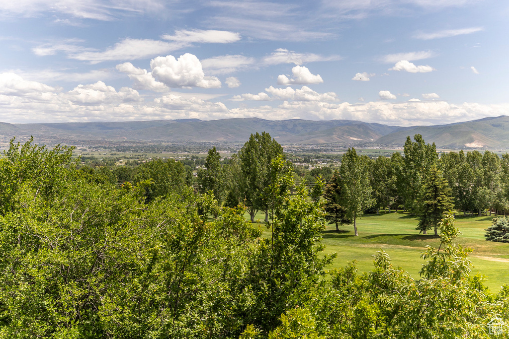 View of mountain backdrop featuring a golf course