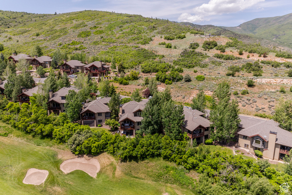 Aerial view of residential area with mountains