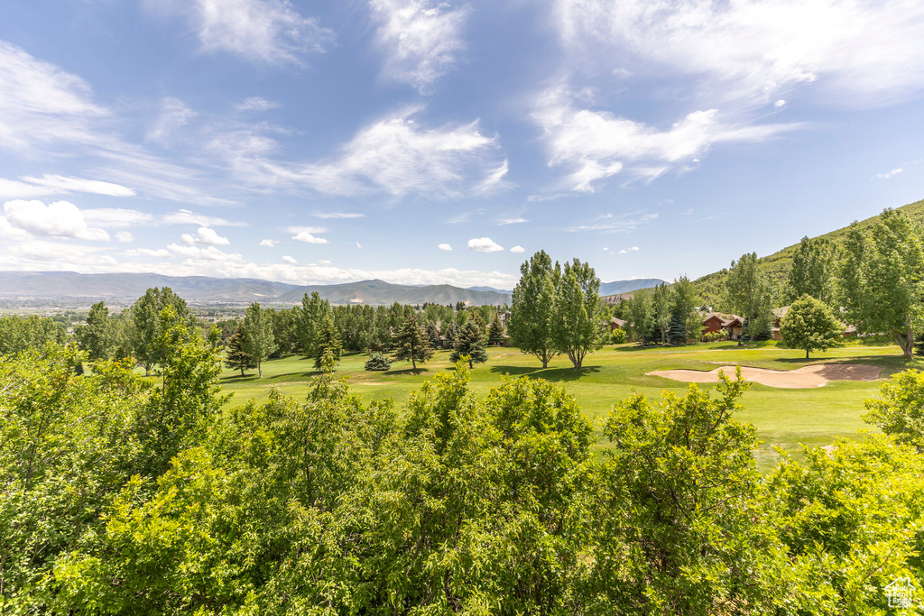 View of mountain backdrop featuring a golf course