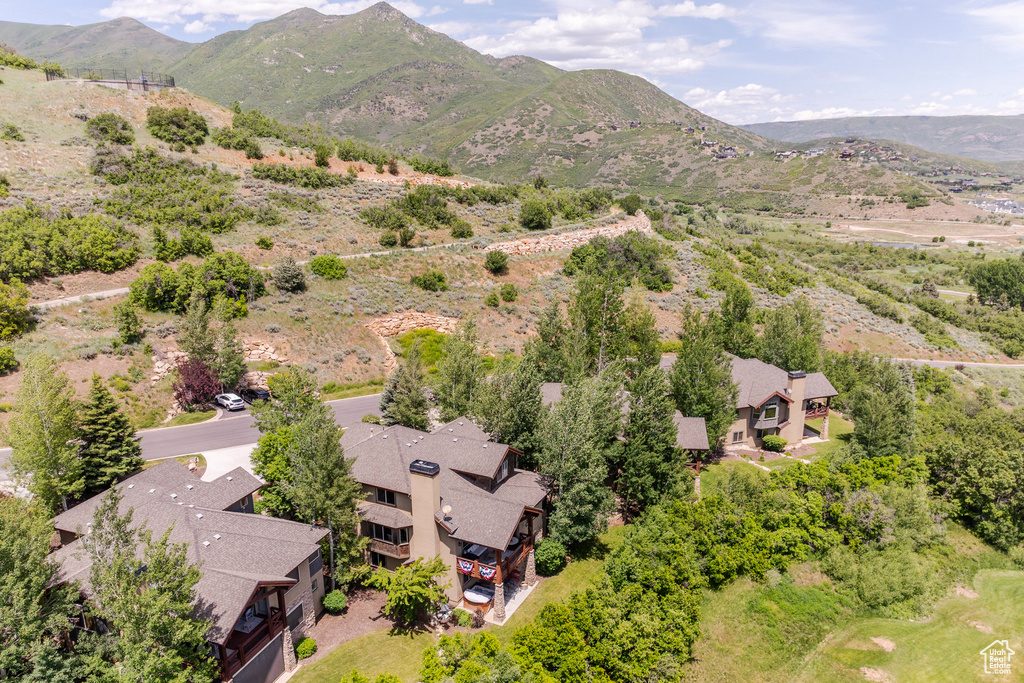 Aerial view of residential area with a mountainous background