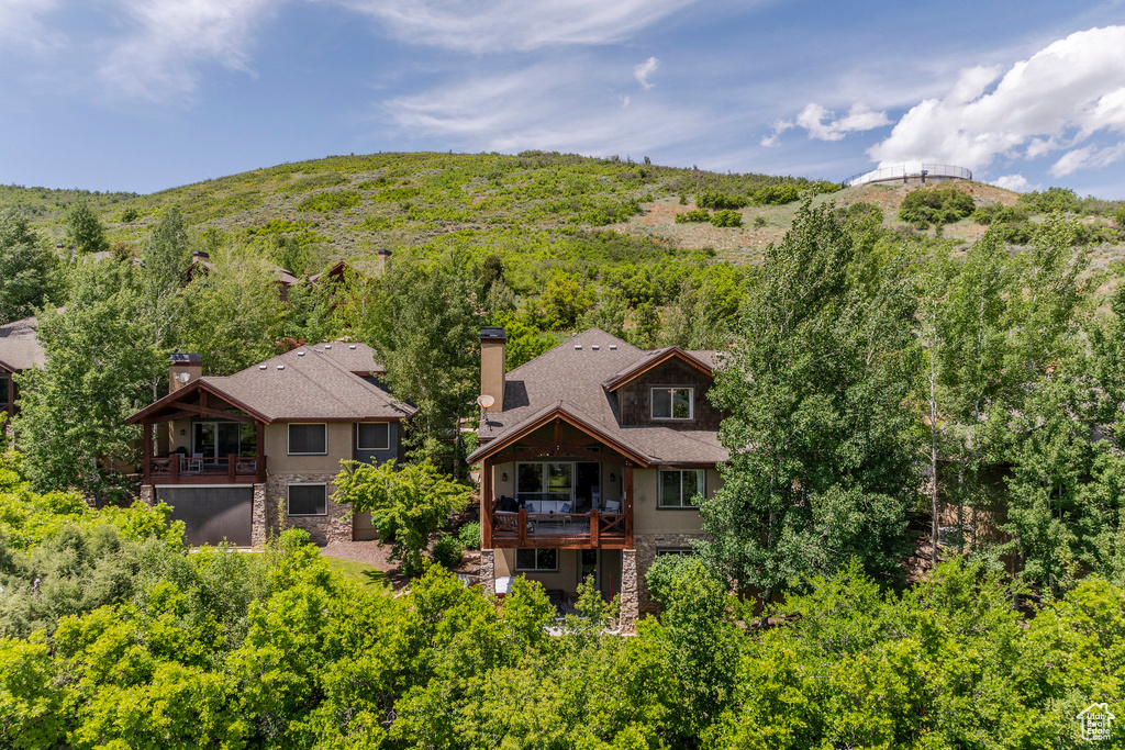View from above of property featuring a mountainous background
