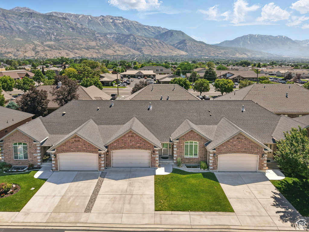 Aerial view of residential area with mountains