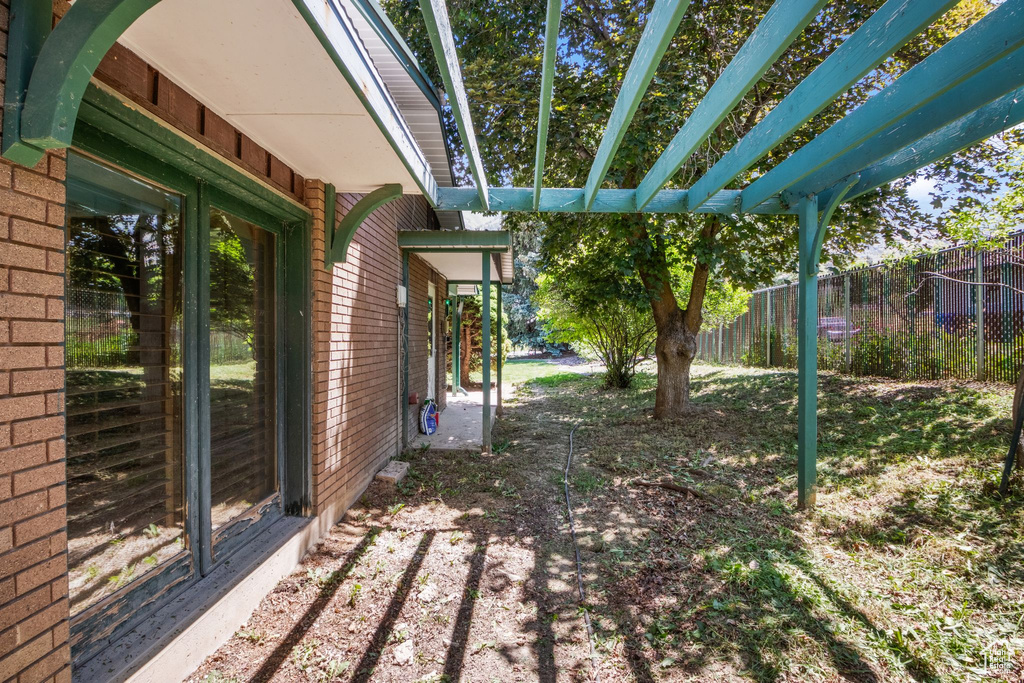 View of yard with a pergola