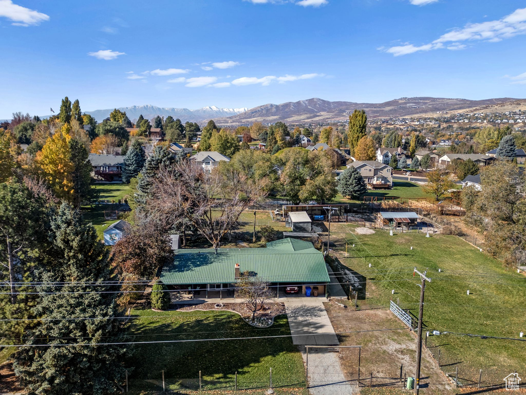 Aerial view of residential area with a mountainous background