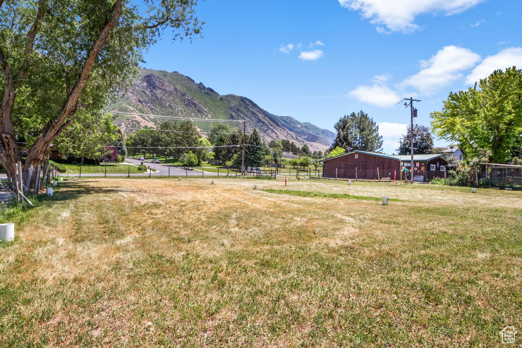 View of yard with a mountain view