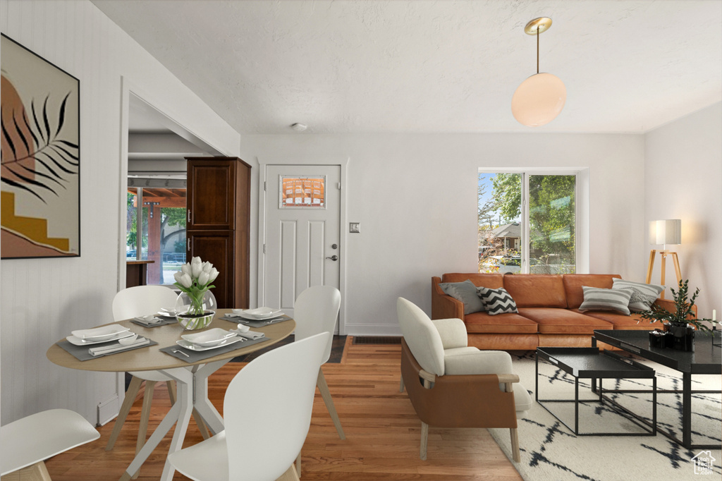 Living room featuring wood finished floors and baseboards