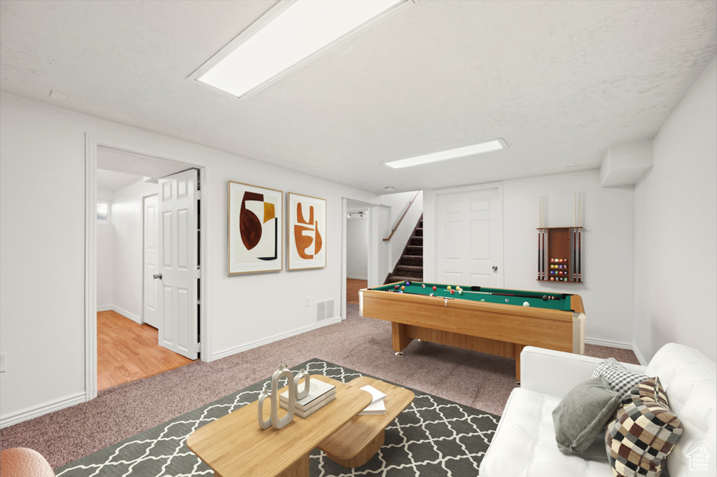 Rec room with billiards table and carpet