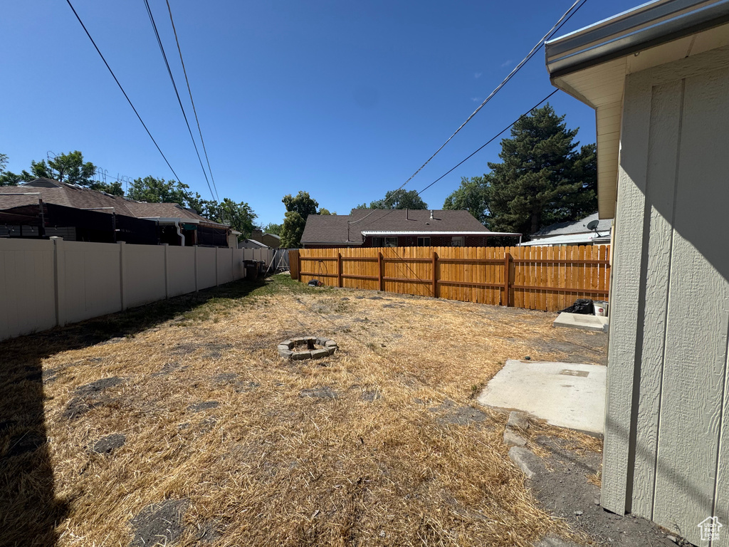 View of fenced backyard