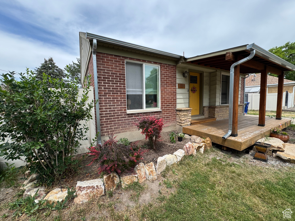 View of front of property with brick siding