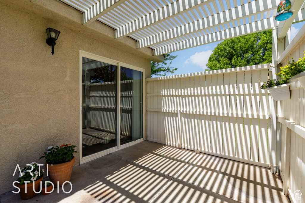 View of patio featuring a pergola