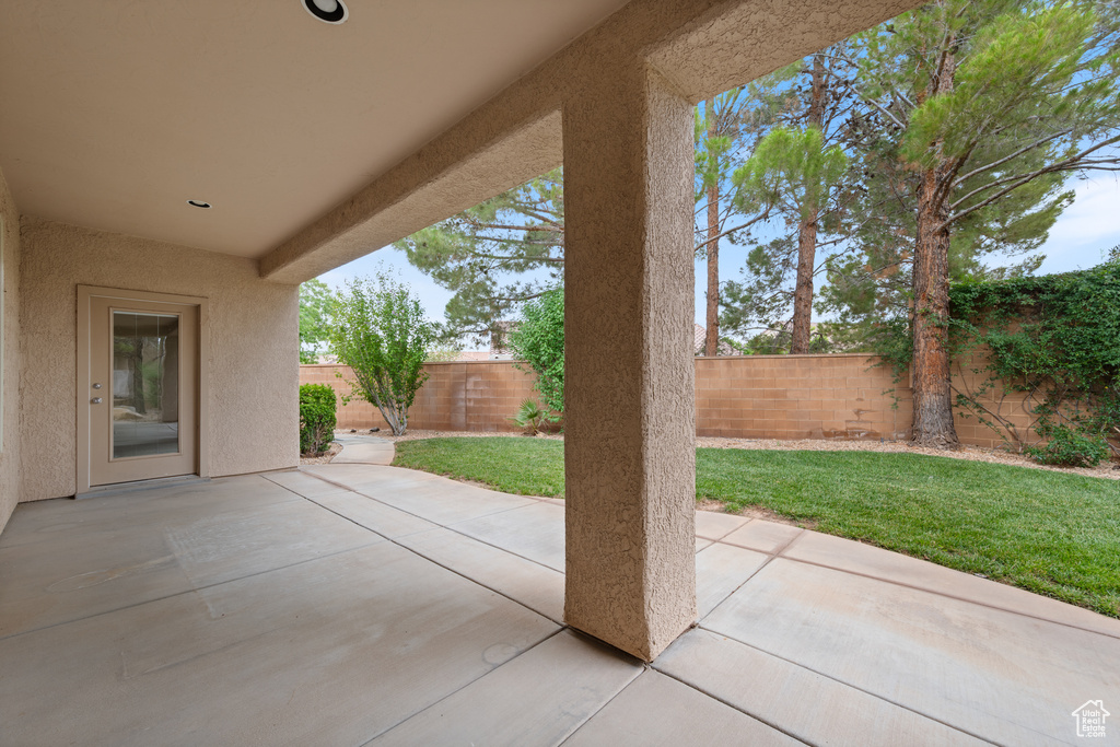 Fenced backyard featuring a patio area