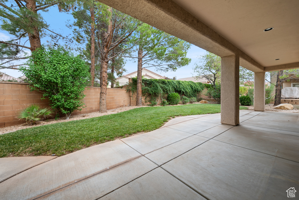 Fenced backyard featuring a patio area