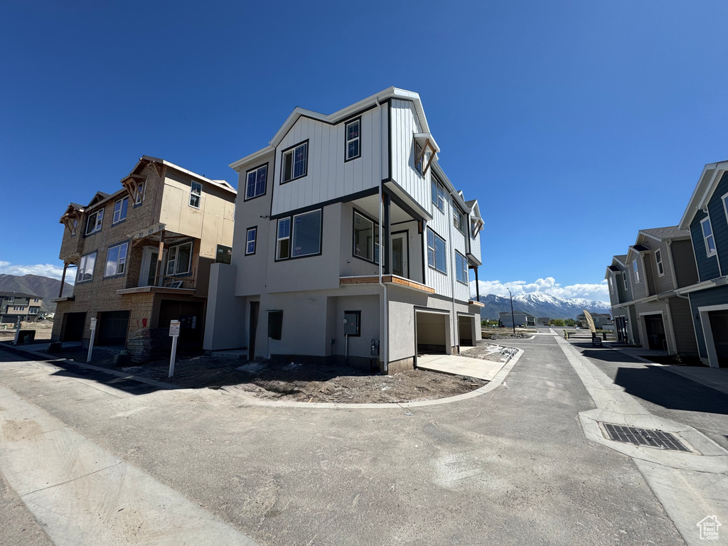 View of asphalt street with a mountain view