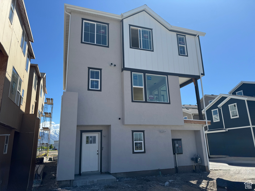 View of front of home with stucco siding