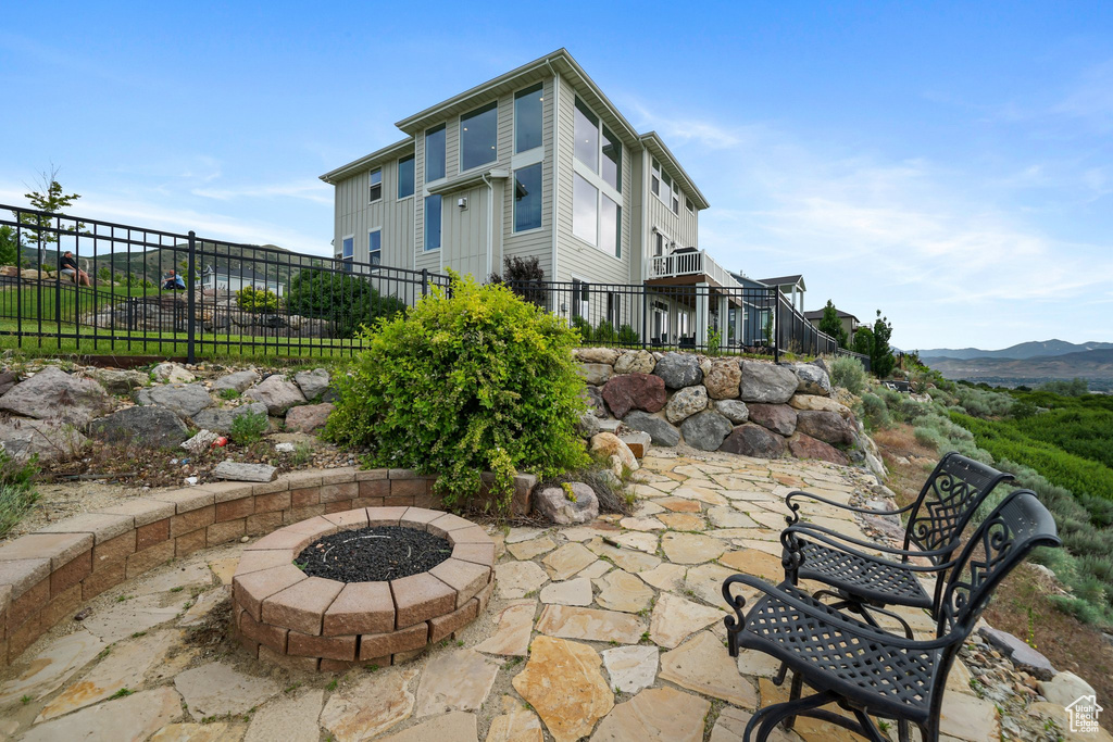 View of patio / terrace with a fire pit