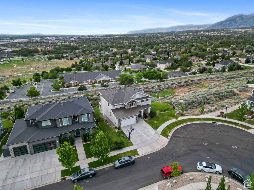 Aerial perspective of suburban area featuring mountains