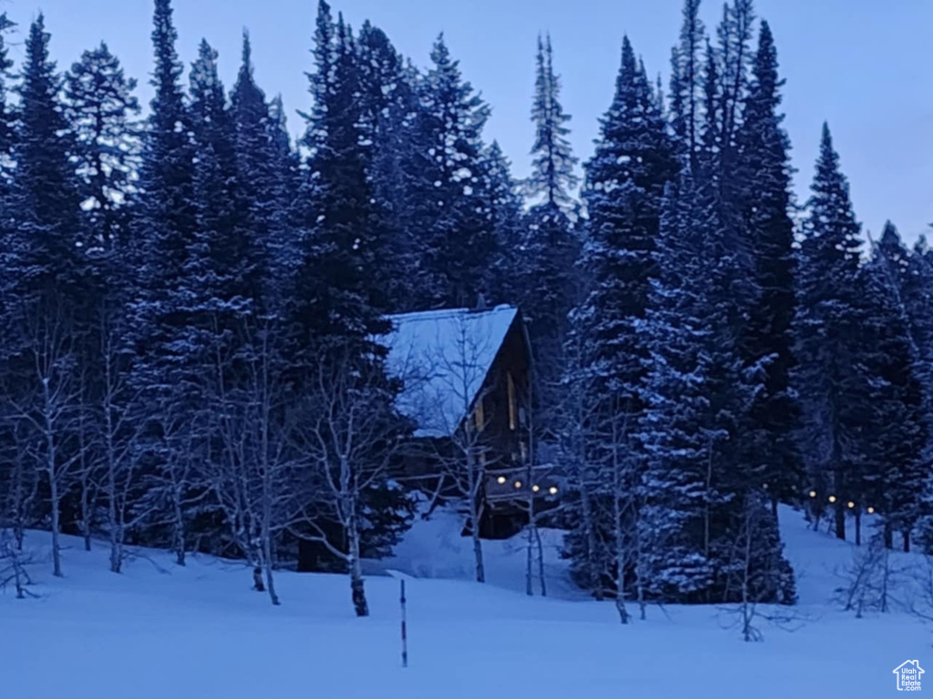 View of home\'s community featuring a view of trees