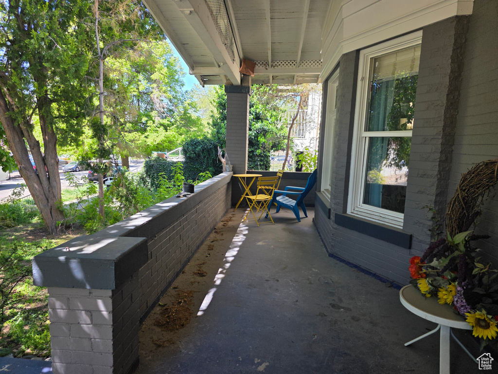 View of patio featuring a porch