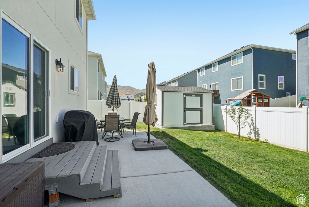View of patio / terrace featuring outdoor dining space and grilling area