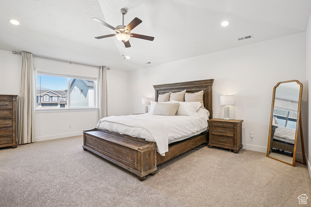 Bedroom with baseboards, light carpet, recessed lighting, and ceiling fan