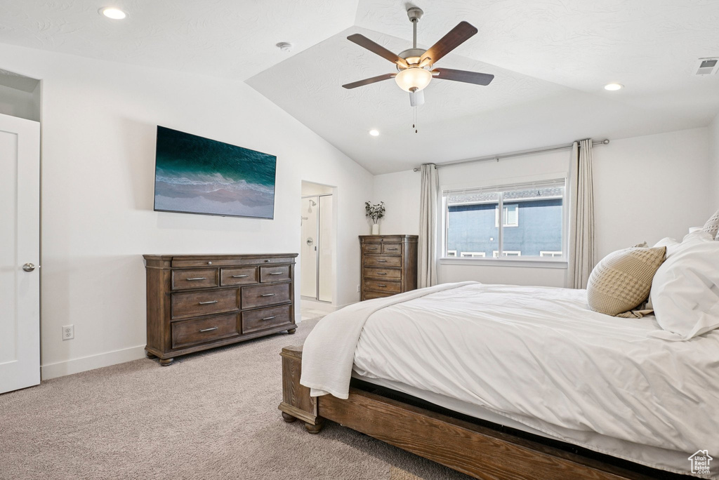 Bedroom featuring vaulted ceiling, recessed lighting, light carpet, baseboards, and ceiling fan