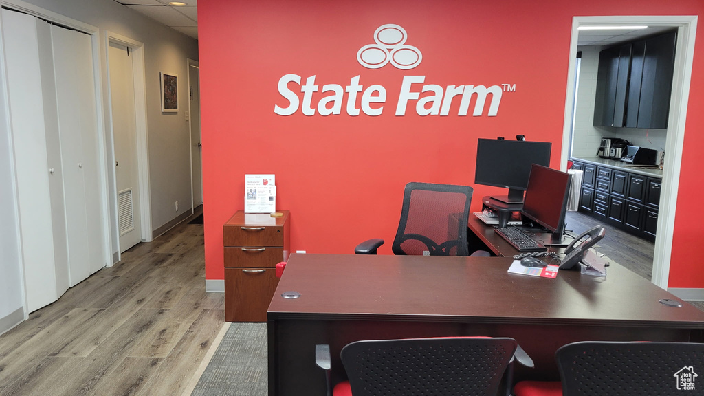 Office space featuring wood finished floors