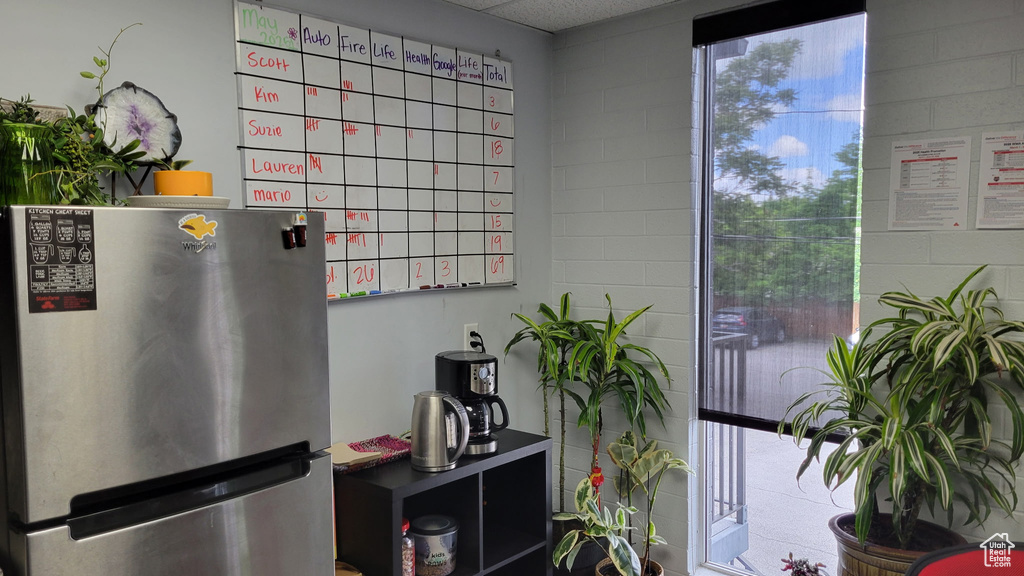 Kitchen view of freestanding refrigerator