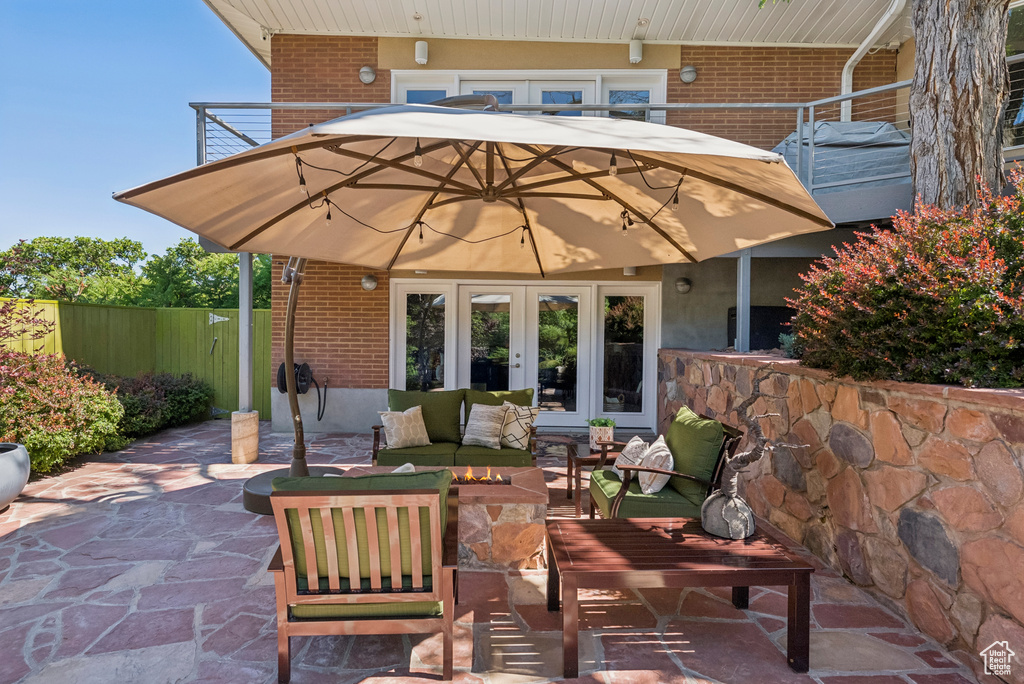 View of patio / terrace with french doors, outdoor lounge area, and grilling area