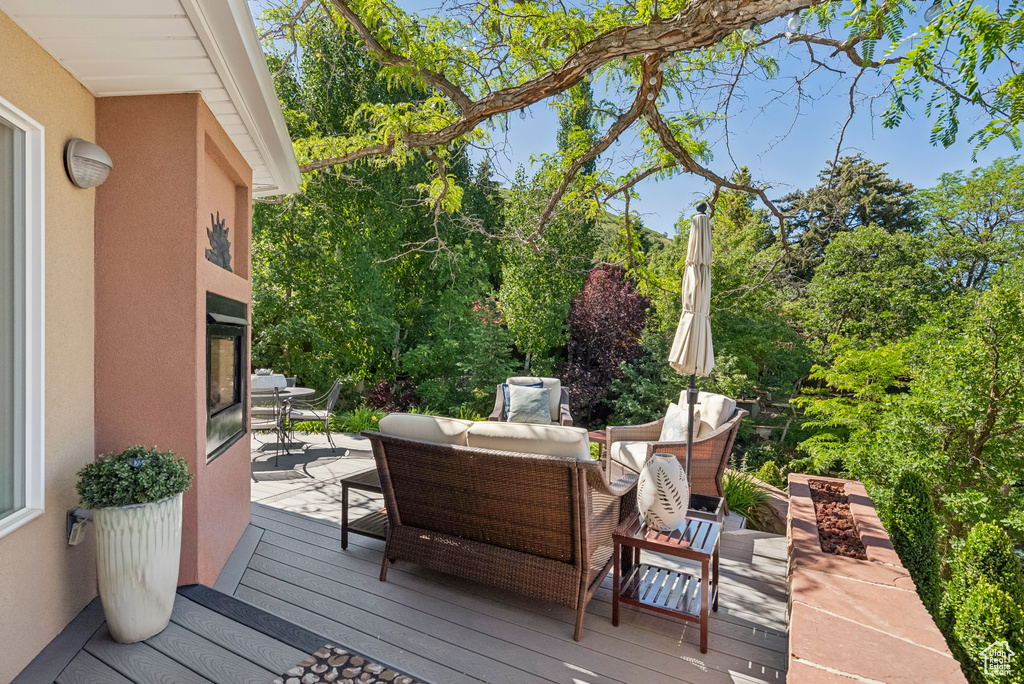 Deck with an outdoor living space