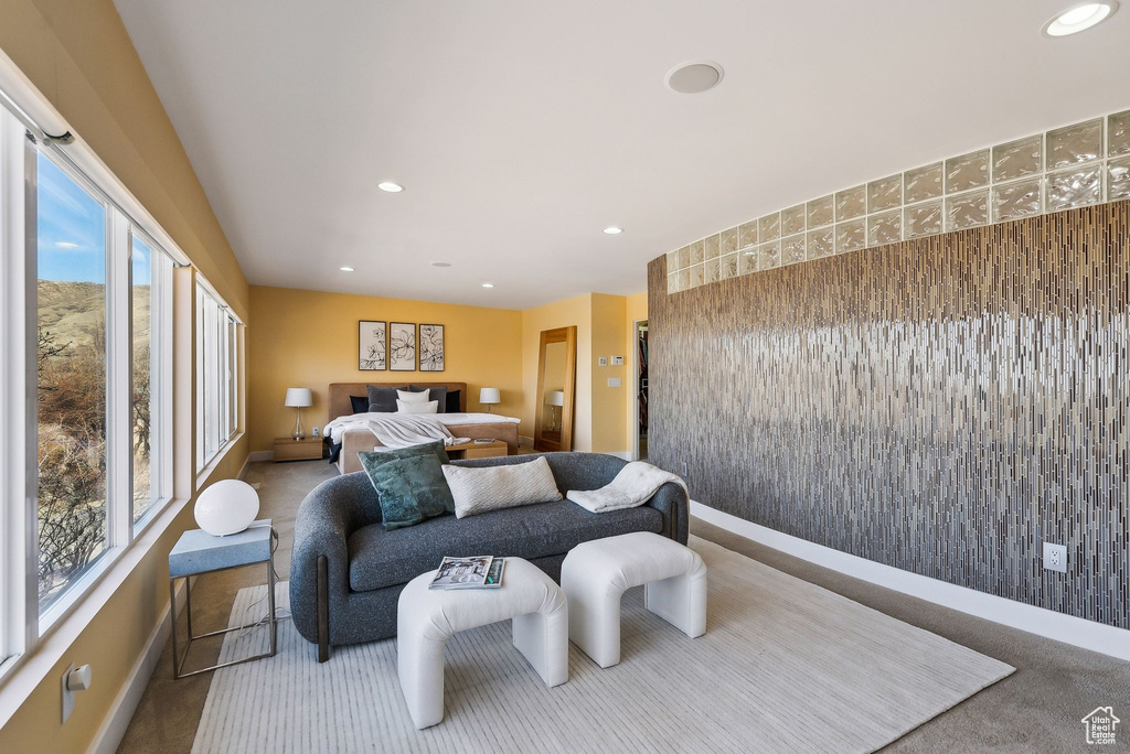 Carpeted bedroom featuring baseboards and recessed lighting