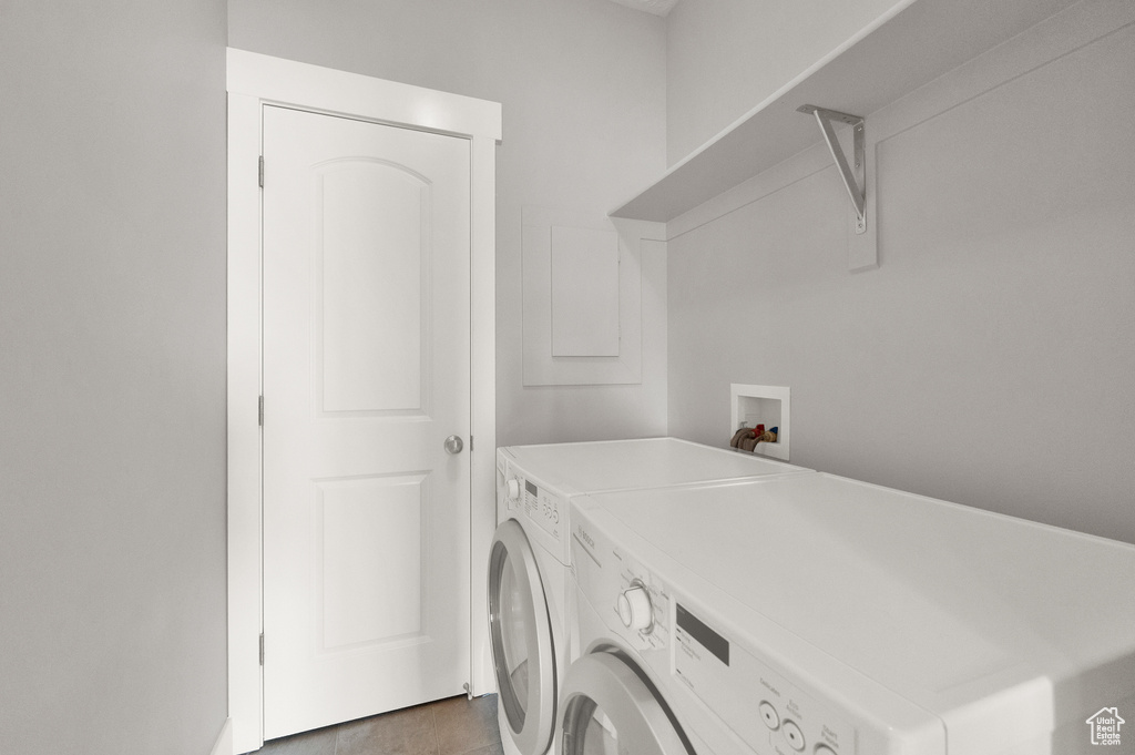 Laundry room featuring washing machine and dryer