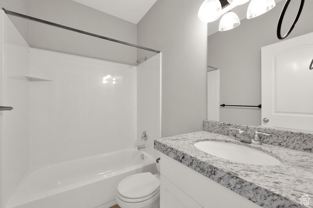 Bathroom featuring vanity and shower / washtub combination