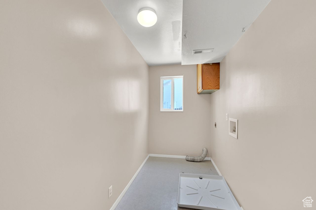 Laundry area with washer hookup and electric dryer hookup