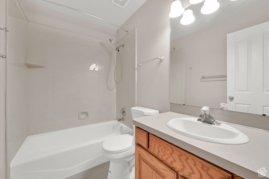 Bathroom with vanity and  shower combination